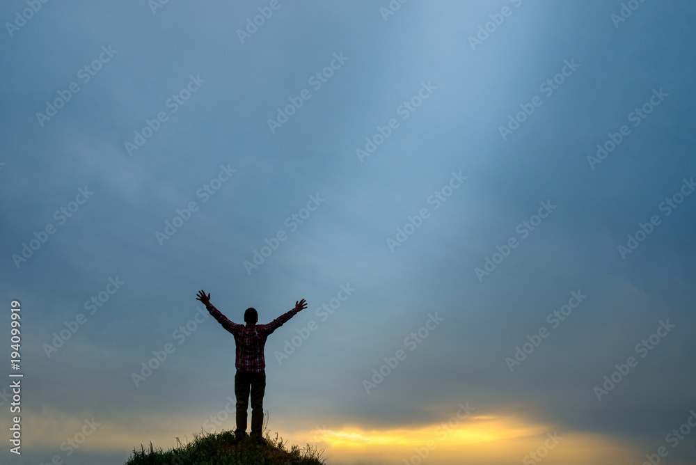 the believer raises his hands to heaven and god Stock Photo | Adobe Stock