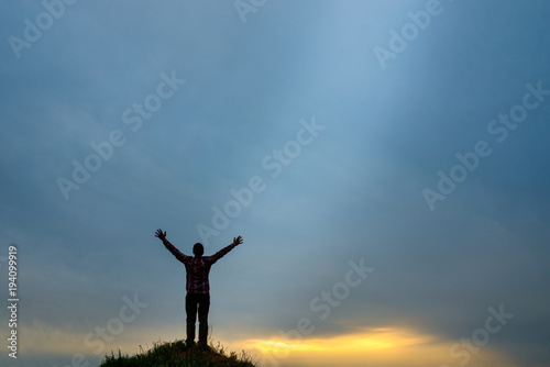the believer raises his hands to heaven and god
