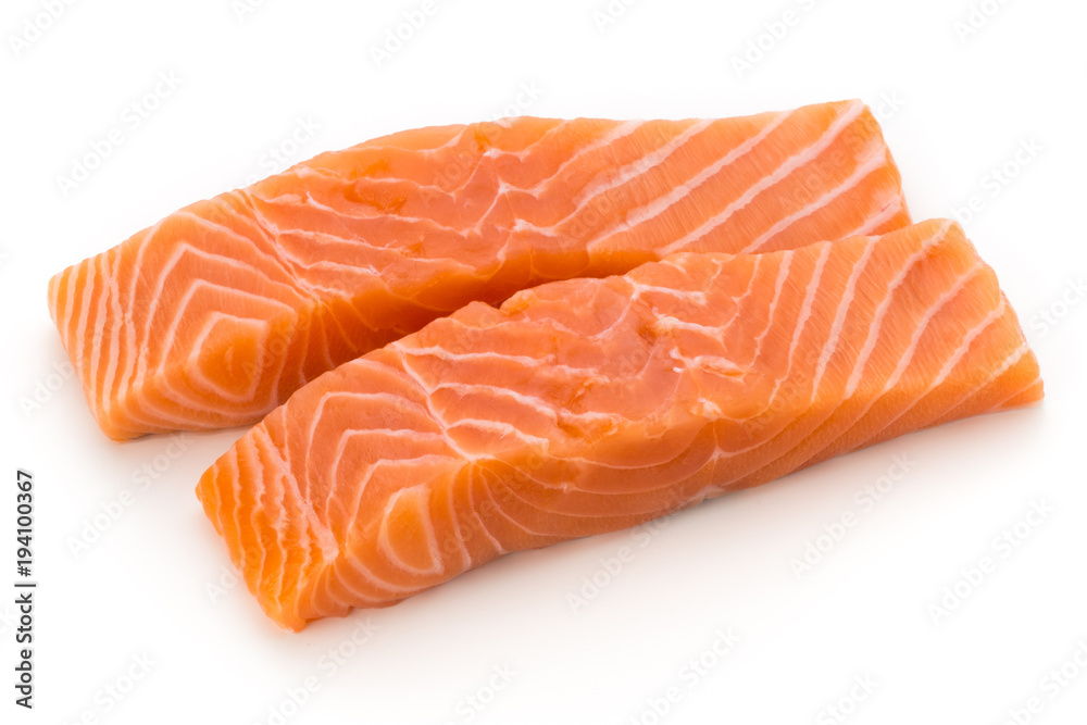 Fresh salmon fillet with basil on the white background. Fresh salmon fillet with basil on the white background.