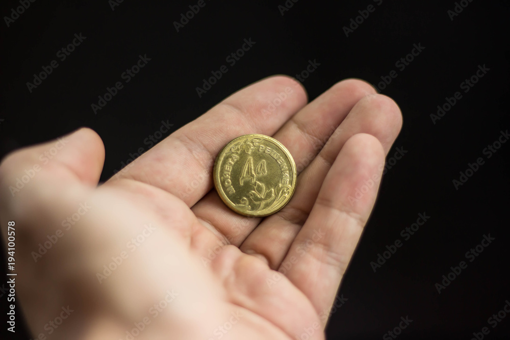 Hand throws a coin. The concept of decision-making. Hand throws a coin. The concept of decision-making.