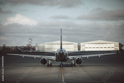Passenger plane rides after landing photo