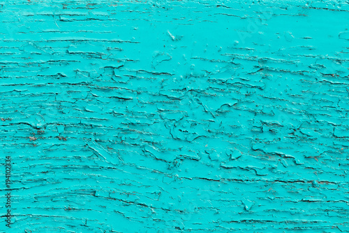 Old turquoise painted wood, weathered surface
