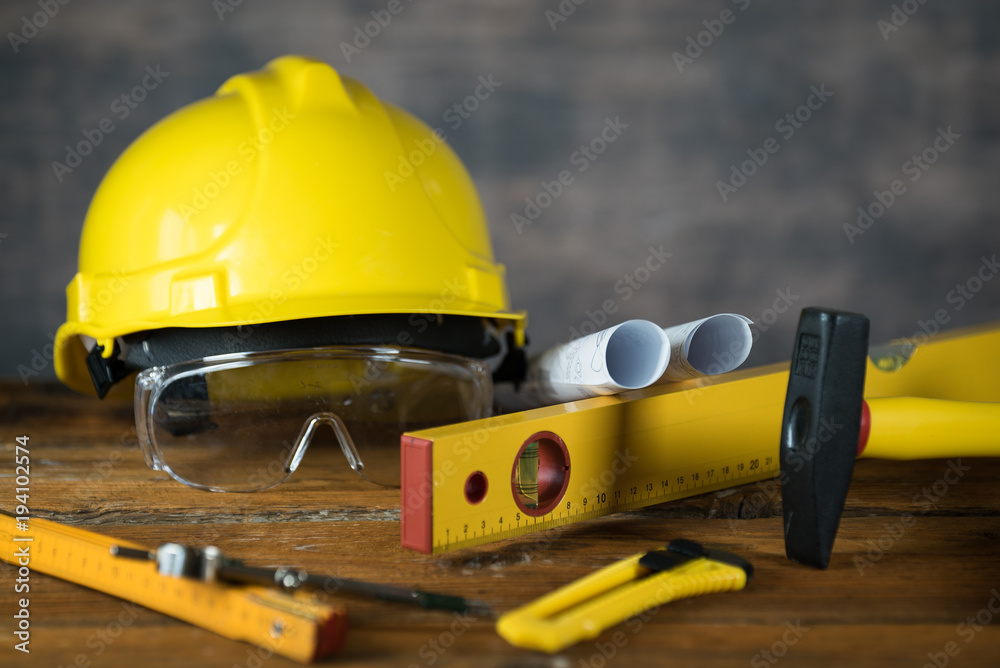 Fototapeta premium construction tooling on wooden board maintenance concept.