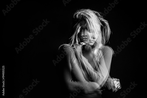 Emotional dreamy woman portrait triple Multiple exposure black and white photo. Hug suport and love emotions mood
