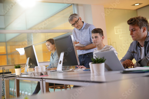 Students in apprenticeship attending computing class