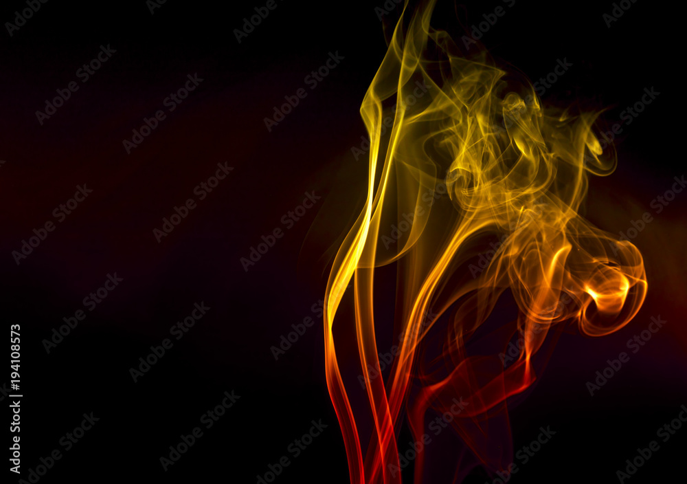 Colored smoke on black background Colored smoke on black background