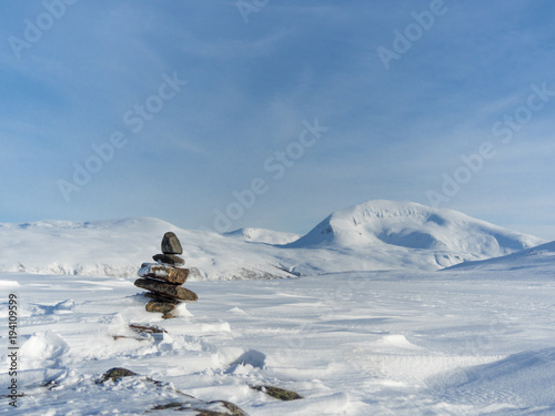 Stacked stones in winter photo