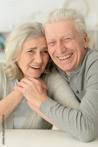 senior couple laughing  at home
