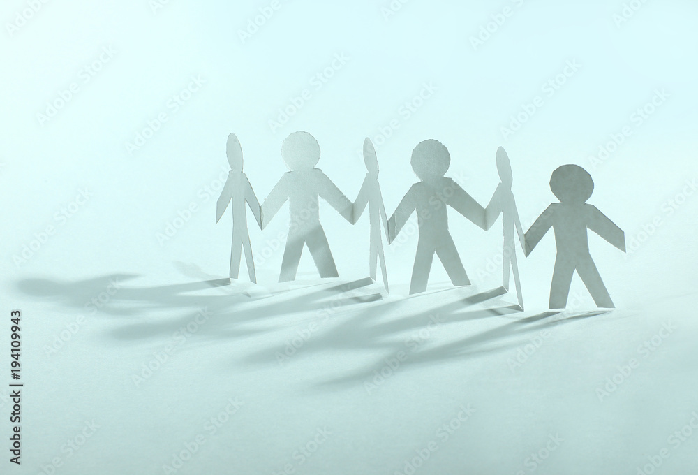 concept of teamwork.team paper men standing concept of teamwork.team paper men standing