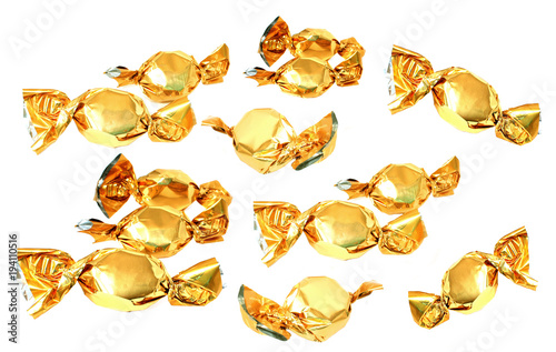 candy in golden foil isolated on white