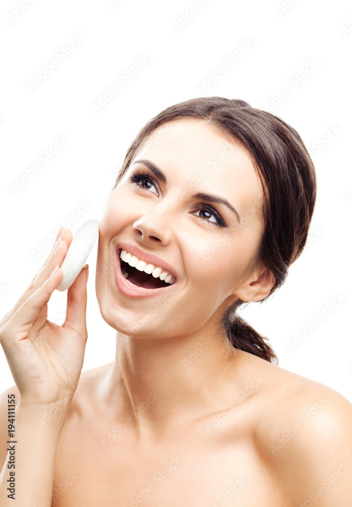 Young woman cleaning skin by cotton pad, over white Young woman cleaning skin by cotton pad, over white