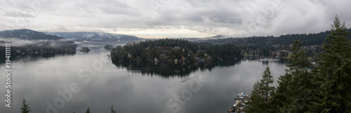 Beautiful panoramic view of Deep Cove from the Top of Quarry Rock. Taken in North Vancouver, British Columbia, Canada, during a vibrant winter morning.