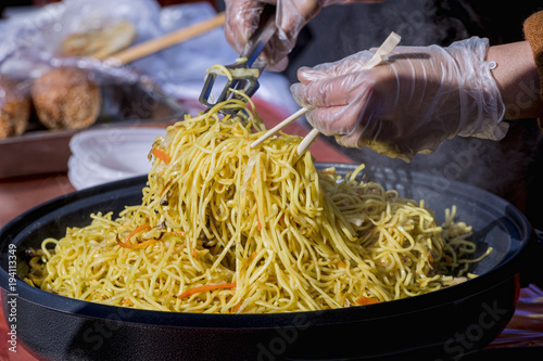 Close-up cooking at a street market of Chinese food