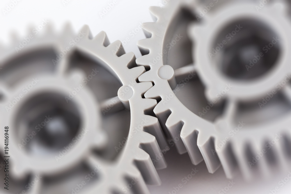 Gray plastic gears with selective focus Gray plastic gears with selective focus