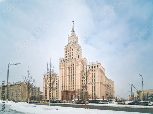 Winter view of neo-classical Stalin-era high-rise building on Red Gate Square, Garden Ring road in Moscow. Russia. Copy space