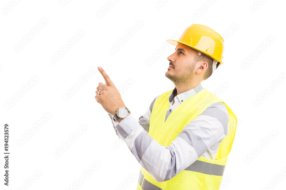 Architect constructor or engineer pointing and looking up.