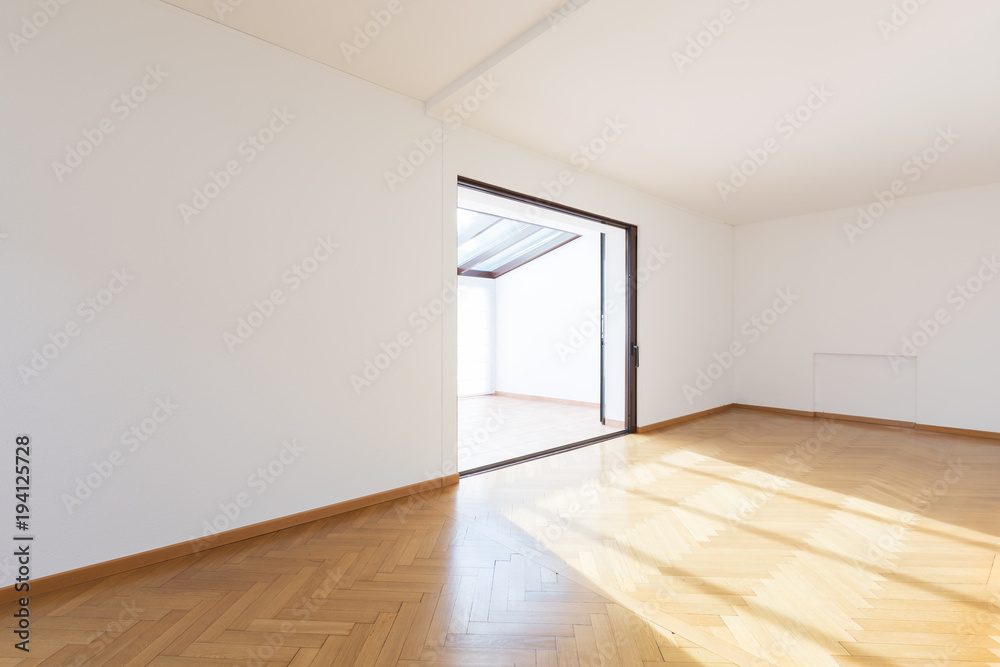 New room completely empty with wooden floors New room completely empty with wooden floors