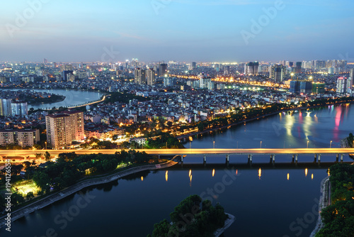 Aerial skyline view of Hanoi cityscape at twilight. Linh Dam peninsula, Hoang Mai district, Hanoi, Vietnam