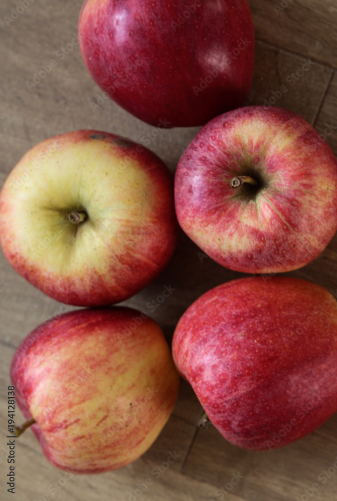 Fresh red and yellow royal gala apples on wooden background Fresh red and yellow royal gala apples on wooden background