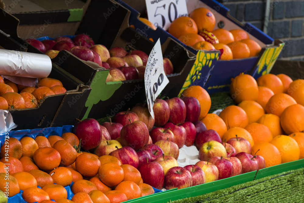 Red apples and Oranges market stall