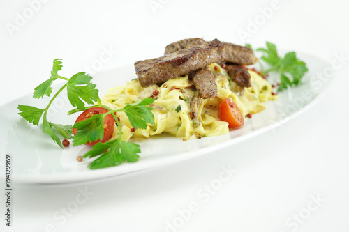 Meat with spaghetti and tomato