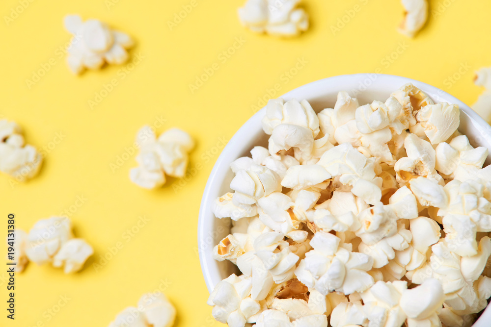 Bright yellow background. Fresh pop corn. Fried corn Bright yellow background. Fresh pop corn. Fried corn