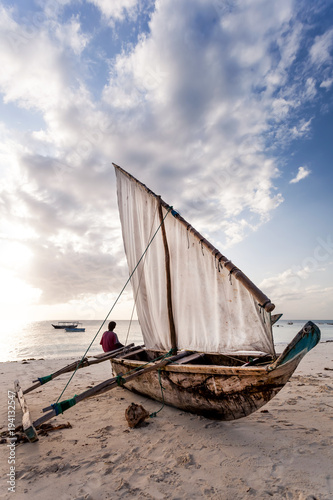 Obraz na plátně Dhow on the beach in Zanzibar. Fishing boat on the beach.