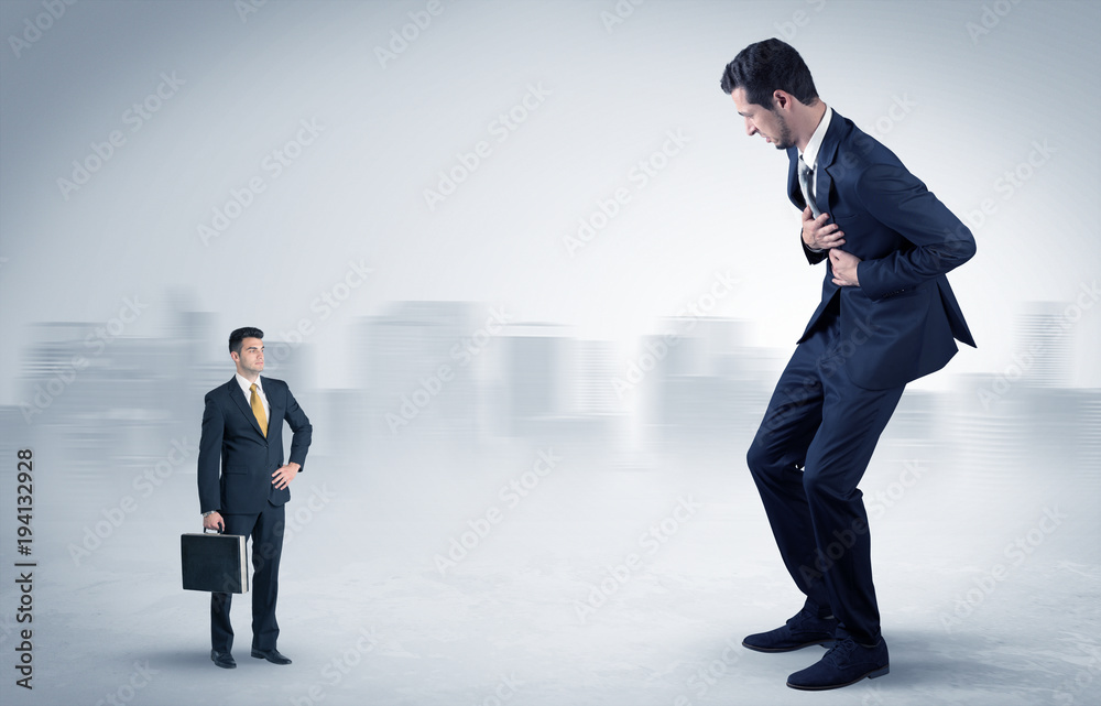 Giant businessman is  afraid of small executor