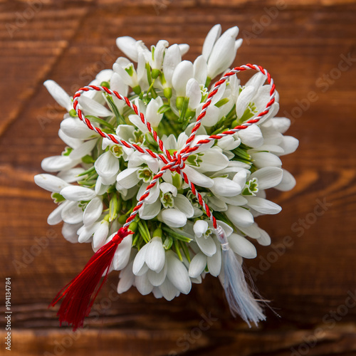 Snowdrops and red and white string