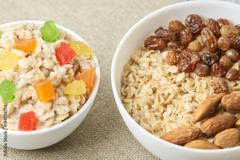 Oatmeal with almonds and raisins. Porridge with dried fruits Oatmeal with almonds and raisins. Porridge with dried fruits