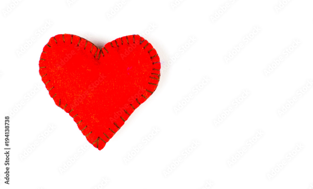 Heart made of fabric on a white background.