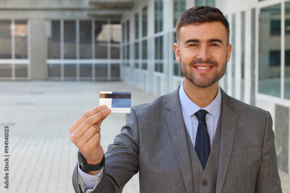 Man proudly showing a card Man proudly showing a card