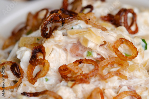 Close up Homemade    Caramelized Onion, Crab and Bacon Dip. (selective Focus)