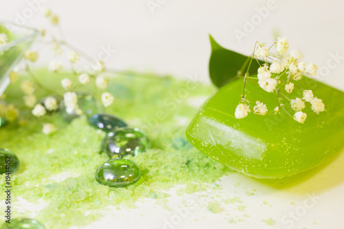 Spa concept with green bath salt