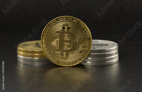 bitcoin and litecoin on black background