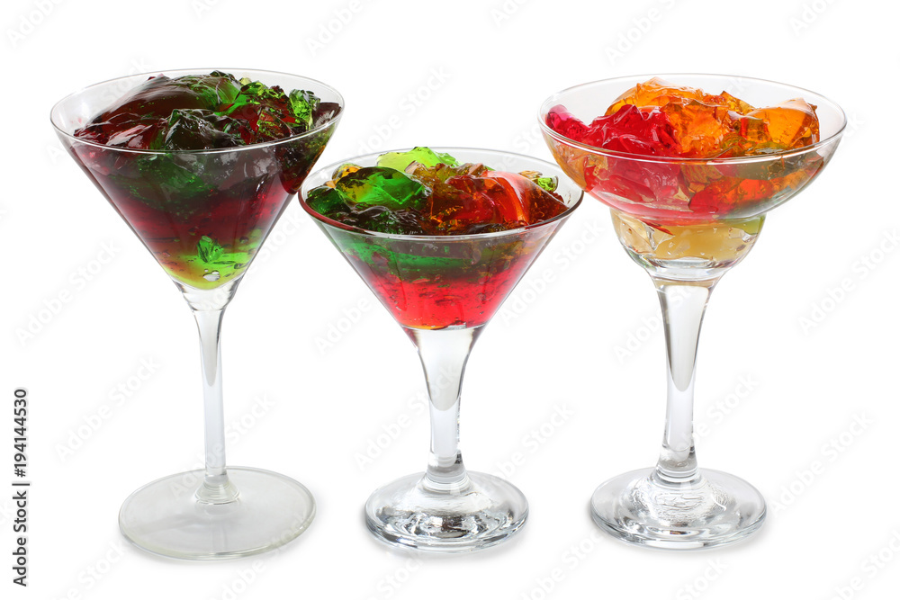 Sweet jam and fruit in glass on white background Sweet jam and fruit in glass on white background