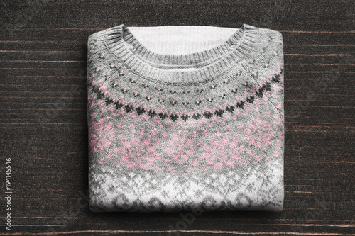 Sweater on wooden background