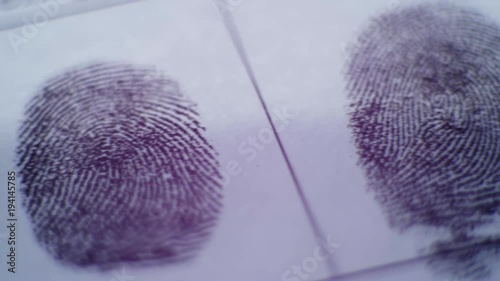 Fingerprint on police fingerprint card CSI