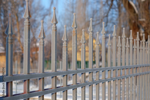 Image of a beautiful iron fence. Metal guardrail close up.