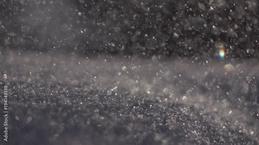 Snowdrift under thick snowfall in low sun. Winter sunny lyric scene in back light close up in slow motion. Sparkling snowy macro background.
Snowdrift under thick snowfall in low sun. Winter sunny lyric scene in back light close up in slow motion. Sparkling snowy macro background.