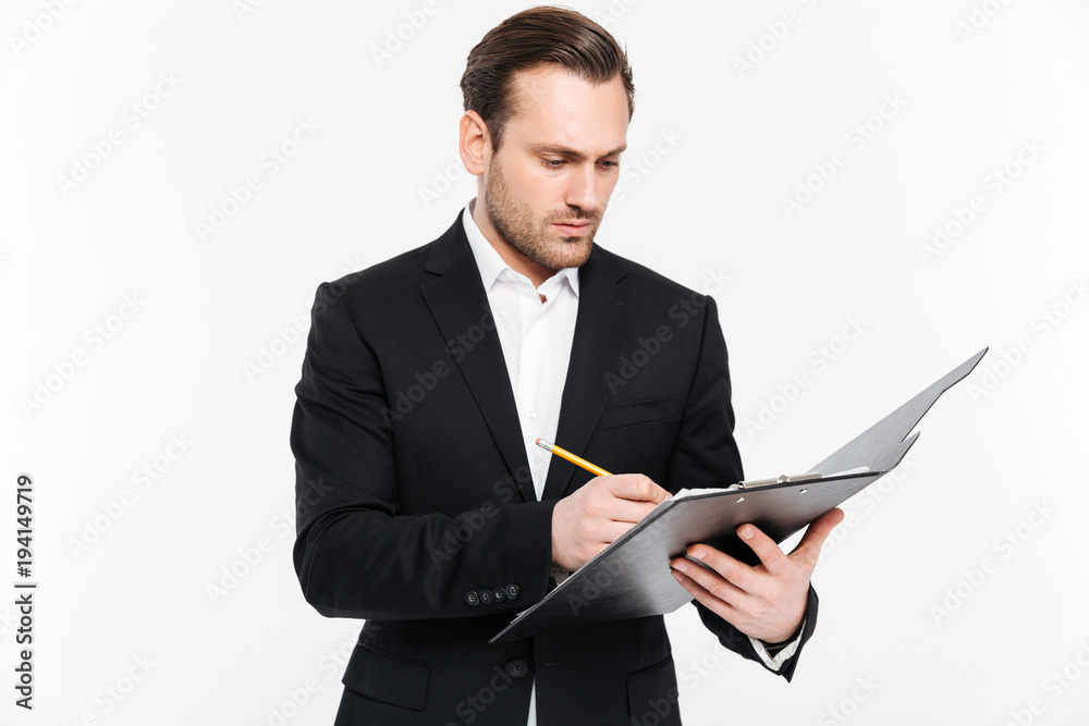 Portrait of a concentrated young businessman