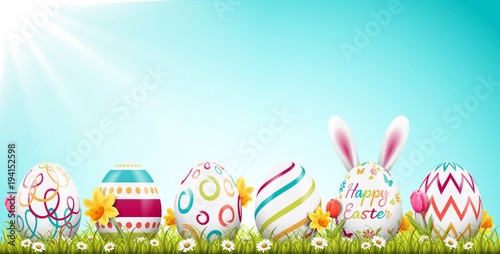 Easter background with easter eggs and easter bunny