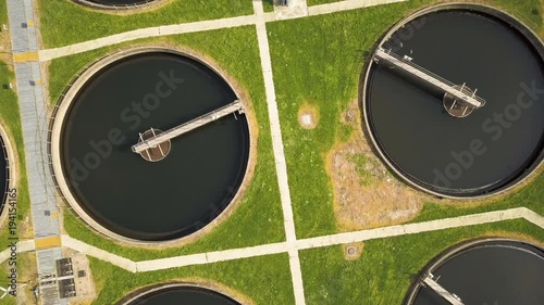 Sewage Farm water filter tanks; aerial drone view zoom out
