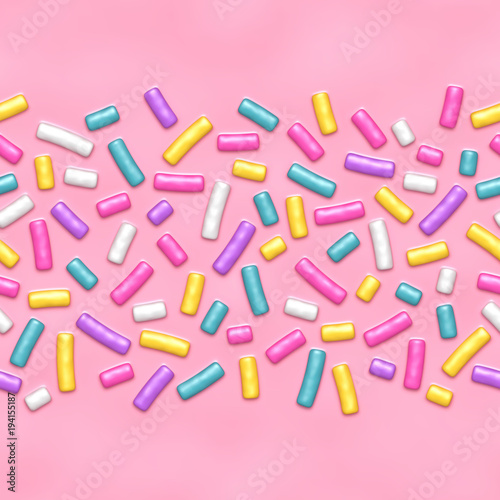 Seamless background of pink candy donut glaze with many decorative sprinkles