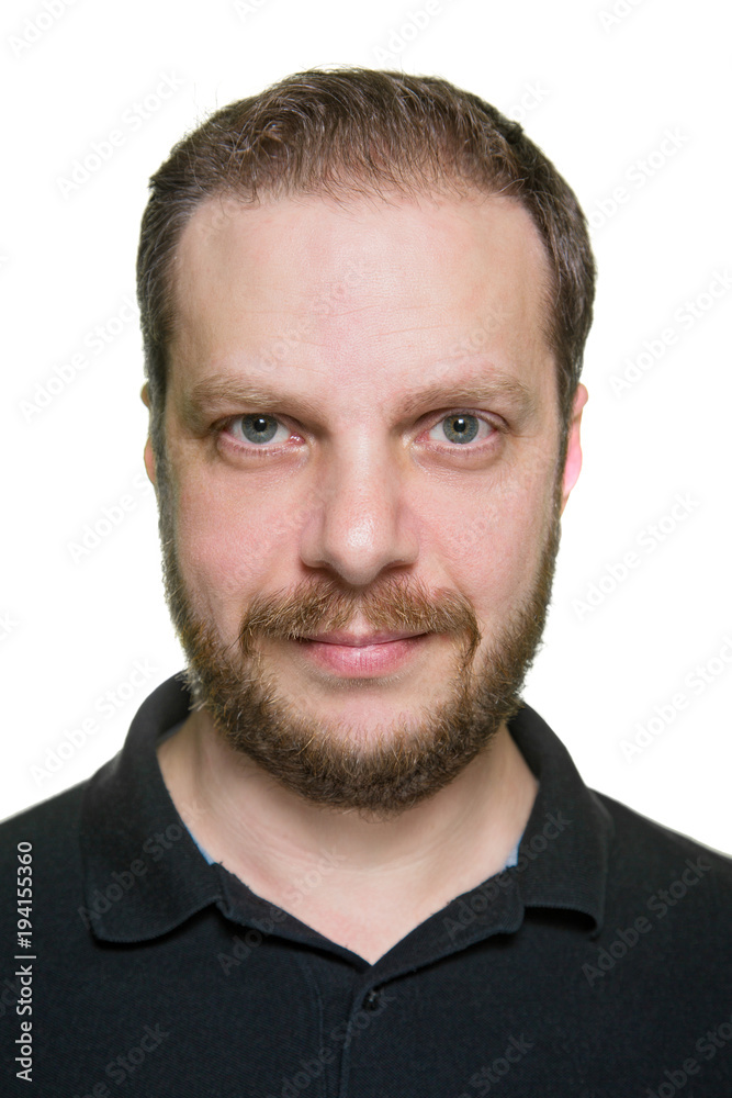 Portrait of adult bearded man against white background. Portrait of adult bearded man against white background.