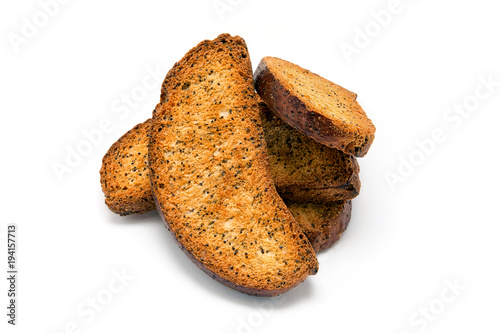 Wheat crackers with poppy seeds on a white background