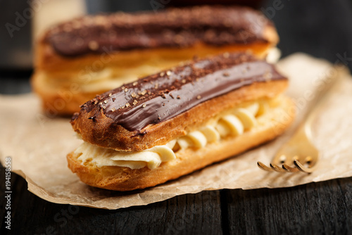 Stampa su tela Traditional french eclairs with chocolate.