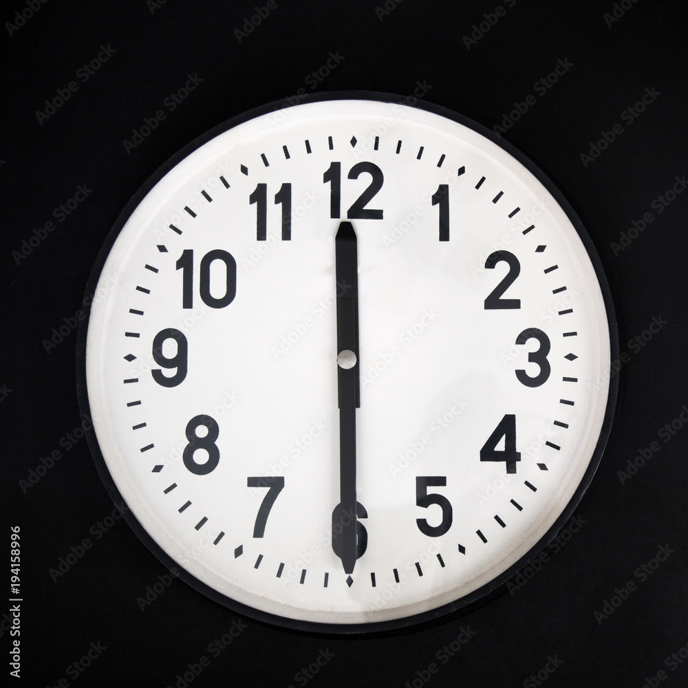 wall clock ion black background . place for text. wall clock ion black background . place for text.