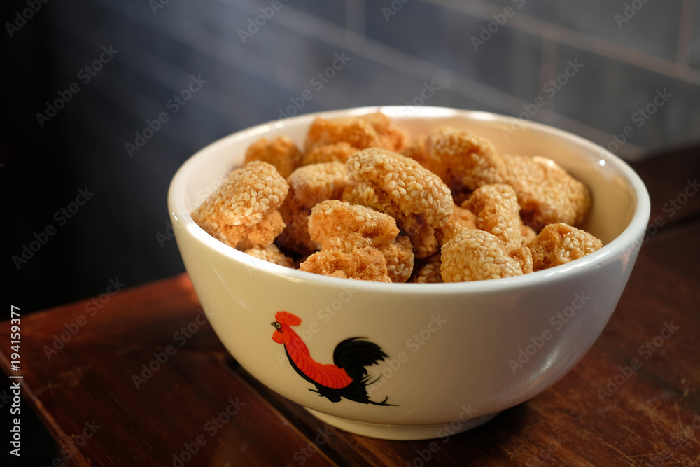 A bowl of Chinese sesame cookies. It is a traditional Chinese New Year festival snack in Guangdong province. Its also has a nickname of 