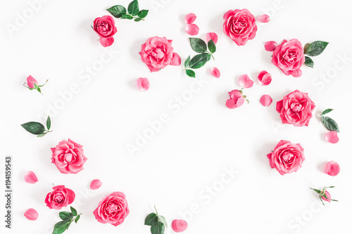 Flowers composition. Frame made of pink rose flowers on white background. Flat lay  top view  copy space